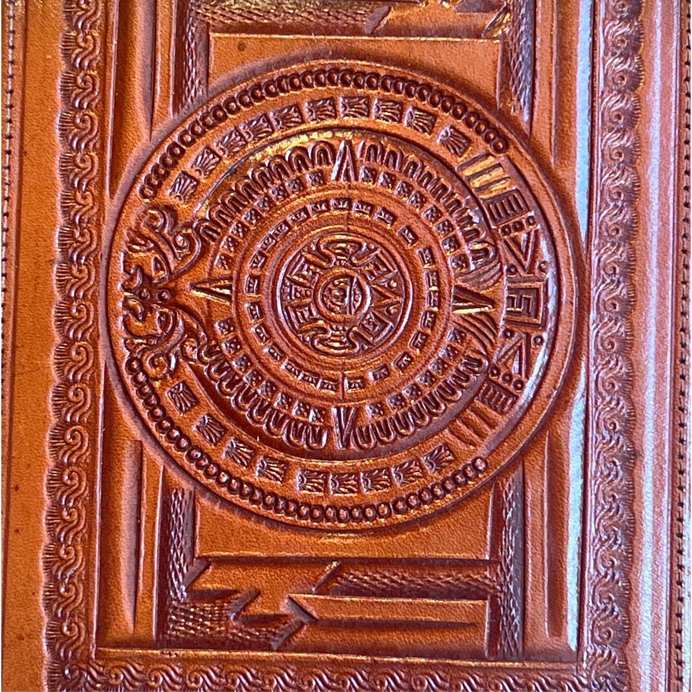 Beautiful and intricate markings. Wallet and checkbook leather from Mexico.